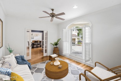 Nestled on a quiet tree-lined street, this custom-built home on Members Club At St. James Plantation in North Carolina - for sale on GolfHomes.com, golf home, golf lot