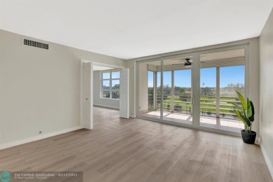 Completely and magnificently updated PENTHOUSE unit with on Palm-Aire Country Club and Resort - Palms in Florida - for sale on GolfHomes.com, golf home, golf lot