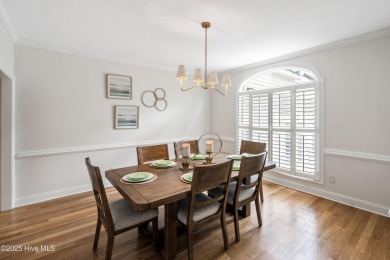 Nestled on a quiet tree-lined street, this custom-built home on Members Club At St. James Plantation in North Carolina - for sale on GolfHomes.com, golf home, golf lot