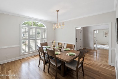 Nestled on a quiet tree-lined street, this custom-built home on Members Club At St. James Plantation in North Carolina - for sale on GolfHomes.com, golf home, golf lot