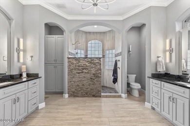 The epitome of privacy and luxury, the gated Lionspaw Grand on LPGA International Golf Course in Florida - for sale on GolfHomes.com, golf home, golf lot