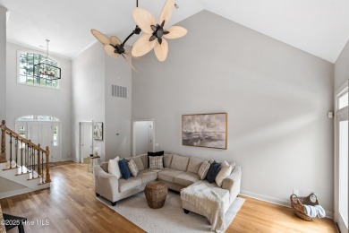 Nestled on a quiet tree-lined street, this custom-built home on Members Club At St. James Plantation in North Carolina - for sale on GolfHomes.com, golf home, golf lot