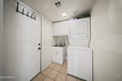 Welcome to this beautifully maintained 3-bedroom, 2.5-bath home on Palm Valley Golf Club  in Arizona - for sale on GolfHomes.com, golf home, golf lot