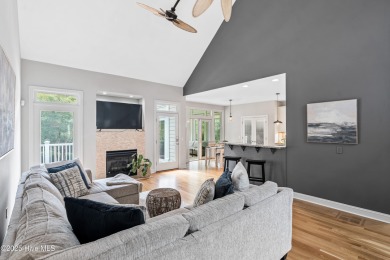 Nestled on a quiet tree-lined street, this custom-built home on Members Club At St. James Plantation in North Carolina - for sale on GolfHomes.com, golf home, golf lot
