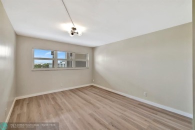 Completely and magnificently updated PENTHOUSE unit with on Palm-Aire Country Club and Resort - Palms in Florida - for sale on GolfHomes.com, golf home, golf lot