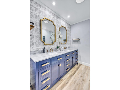 Welcome to this beautifully updated two-bedroom villa in highly on Highland Lakes Executive Golf Course in Florida - for sale on GolfHomes.com, golf home, golf lot