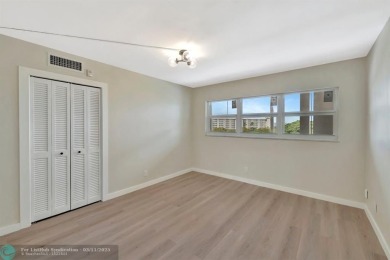 Completely and magnificently updated PENTHOUSE unit with on Palm-Aire Country Club and Resort - Palms in Florida - for sale on GolfHomes.com, golf home, golf lot