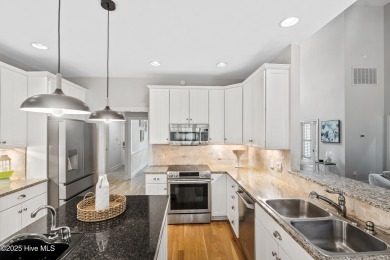 Nestled on a quiet tree-lined street, this custom-built home on Members Club At St. James Plantation in North Carolina - for sale on GolfHomes.com, golf home, golf lot