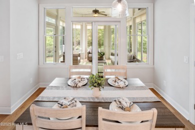 Nestled on a quiet tree-lined street, this custom-built home on Members Club At St. James Plantation in North Carolina - for sale on GolfHomes.com, golf home, golf lot