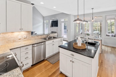 Nestled on a quiet tree-lined street, this custom-built home on Members Club At St. James Plantation in North Carolina - for sale on GolfHomes.com, golf home, golf lot