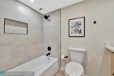 Completely and magnificently updated PENTHOUSE unit with on Palm-Aire Country Club and Resort - Palms in Florida - for sale on GolfHomes.com, golf home, golf lot