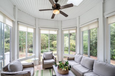 Nestled on a quiet tree-lined street, this custom-built home on Members Club At St. James Plantation in North Carolina - for sale on GolfHomes.com, golf home, golf lot