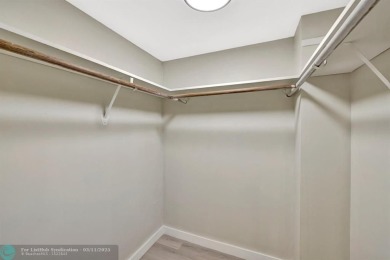 Completely and magnificently updated PENTHOUSE unit with on Palm-Aire Country Club and Resort - Palms in Florida - for sale on GolfHomes.com, golf home, golf lot