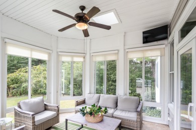 Nestled on a quiet tree-lined street, this custom-built home on Members Club At St. James Plantation in North Carolina - for sale on GolfHomes.com, golf home, golf lot