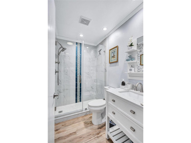 Welcome to this beautifully updated two-bedroom villa in highly on Highland Lakes Executive Golf Course in Florida - for sale on GolfHomes.com, golf home, golf lot