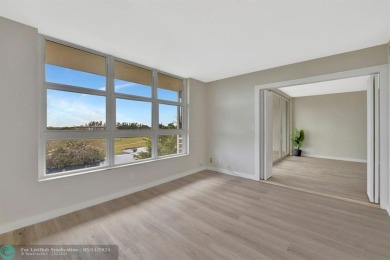Completely and magnificently updated PENTHOUSE unit with on Palm-Aire Country Club and Resort - Palms in Florida - for sale on GolfHomes.com, golf home, golf lot