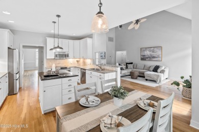 Nestled on a quiet tree-lined street, this custom-built home on Members Club At St. James Plantation in North Carolina - for sale on GolfHomes.com, golf home, golf lot