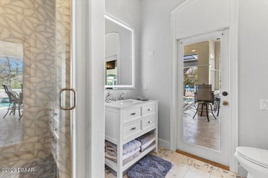 The epitome of privacy and luxury, the gated Lionspaw Grand on LPGA International Golf Course in Florida - for sale on GolfHomes.com, golf home, golf lot