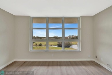 Completely and magnificently updated PENTHOUSE unit with on Palm-Aire Country Club and Resort - Palms in Florida - for sale on GolfHomes.com, golf home, golf lot