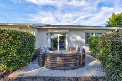 Welcome to this beautifully updated two-bedroom villa in highly on Highland Lakes Executive Golf Course in Florida - for sale on GolfHomes.com, golf home, golf lot