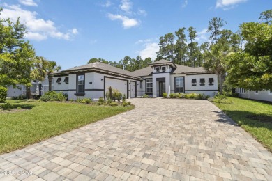 Live the resort lifestyle at 336 Stirling Bridge Drive, nestled on Plantation Bay Golf and Country Club in Florida - for sale on GolfHomes.com, golf home, golf lot
