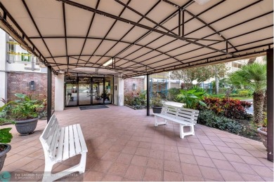 Completely and magnificently updated PENTHOUSE unit with on Palm-Aire Country Club and Resort - Palms in Florida - for sale on GolfHomes.com, golf home, golf lot