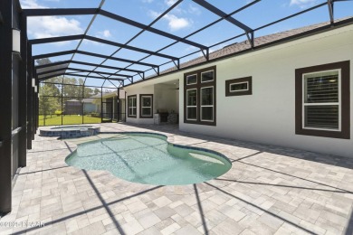 Live the resort lifestyle at 336 Stirling Bridge Drive, nestled on Plantation Bay Golf and Country Club in Florida - for sale on GolfHomes.com, golf home, golf lot