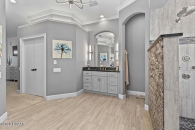 The epitome of privacy and luxury, the gated Lionspaw Grand on LPGA International Golf Course in Florida - for sale on GolfHomes.com, golf home, golf lot