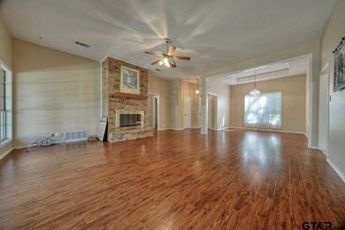 Welcome home to this beautiful 3-bedroom, 2-bathroom retreat on Hide-A-Way Lake Golf Course in Texas - for sale on GolfHomes.com, golf home, golf lot