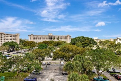 Completely and magnificently updated PENTHOUSE unit with on Palm-Aire Country Club and Resort - Palms in Florida - for sale on GolfHomes.com, golf home, golf lot