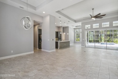 Live the resort lifestyle at 336 Stirling Bridge Drive, nestled on Plantation Bay Golf and Country Club in Florida - for sale on GolfHomes.com, golf home, golf lot