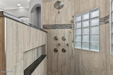 The epitome of privacy and luxury, the gated Lionspaw Grand on LPGA International Golf Course in Florida - for sale on GolfHomes.com, golf home, golf lot