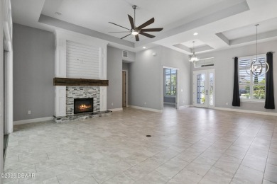 Live the resort lifestyle at 336 Stirling Bridge Drive, nestled on Plantation Bay Golf and Country Club in Florida - for sale on GolfHomes.com, golf home, golf lot