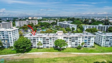 Completely and magnificently updated PENTHOUSE unit with on Palm-Aire Country Club and Resort - Palms in Florida - for sale on GolfHomes.com, golf home, golf lot