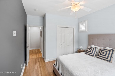 Nestled on a quiet tree-lined street, this custom-built home on Members Club At St. James Plantation in North Carolina - for sale on GolfHomes.com, golf home, golf lot