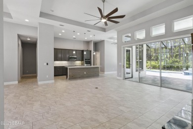 Live the resort lifestyle at 336 Stirling Bridge Drive, nestled on Plantation Bay Golf and Country Club in Florida - for sale on GolfHomes.com, golf home, golf lot