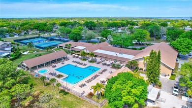 Welcome to this beautifully updated two-bedroom villa in highly on Highland Lakes Executive Golf Course in Florida - for sale on GolfHomes.com, golf home, golf lot