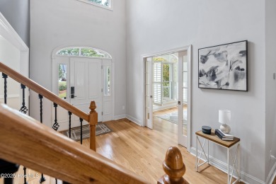 Nestled on a quiet tree-lined street, this custom-built home on Members Club At St. James Plantation in North Carolina - for sale on GolfHomes.com, golf home, golf lot