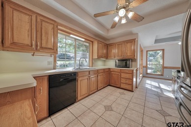 Welcome home to this beautiful 3-bedroom, 2-bathroom retreat on Hide-A-Way Lake Golf Course in Texas - for sale on GolfHomes.com, golf home, golf lot