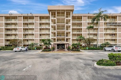 Completely and magnificently updated PENTHOUSE unit with on Palm-Aire Country Club and Resort - Palms in Florida - for sale on GolfHomes.com, golf home, golf lot