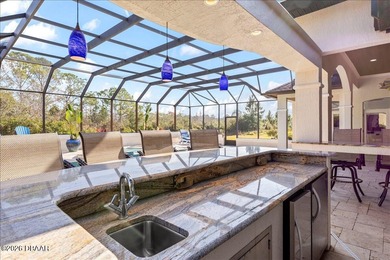 The epitome of privacy and luxury, the gated Lionspaw Grand on LPGA International Golf Course in Florida - for sale on GolfHomes.com, golf home, golf lot