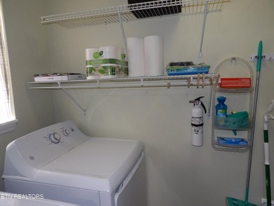 Well-maintained property featuring a 14' RV carport with hookups on Lake Tansi Village Country Club in Tennessee - for sale on GolfHomes.com, golf home, golf lot