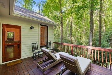 This beautiful, updated home located in Sapphire Valley sits on on Sapphire National Golf Club in North Carolina - for sale on GolfHomes.com, golf home, golf lot