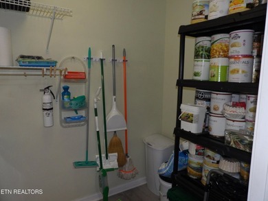 Well-maintained property featuring a 14' RV carport with hookups on Lake Tansi Village Country Club in Tennessee - for sale on GolfHomes.com, golf home, golf lot