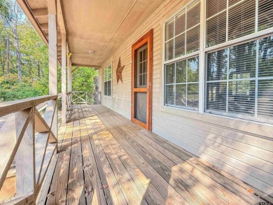 Nestled among the towering pines of East Texas, this beautifully on Holly Lake Ranch Golf Club in Texas - for sale on GolfHomes.com, golf home, golf lot