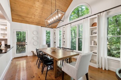 This beautiful, updated home located in Sapphire Valley sits on on Sapphire National Golf Club in North Carolina - for sale on GolfHomes.com, golf home, golf lot
