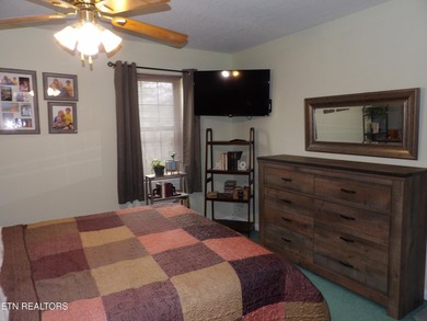 Well-maintained property featuring a 14' RV carport with hookups on Lake Tansi Village Country Club in Tennessee - for sale on GolfHomes.com, golf home, golf lot