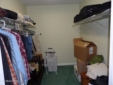 Well-maintained property featuring a 14' RV carport with hookups on Lake Tansi Village Country Club in Tennessee - for sale on GolfHomes.com, golf home, golf lot