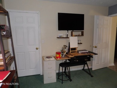 Well-maintained property featuring a 14' RV carport with hookups on Lake Tansi Village Country Club in Tennessee - for sale on GolfHomes.com, golf home, golf lot