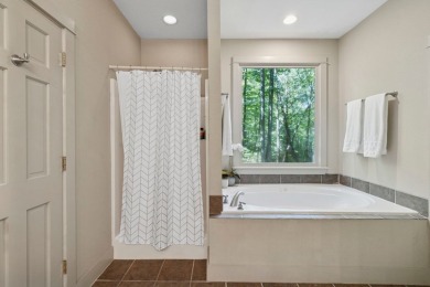 This beautiful, updated home located in Sapphire Valley sits on on Sapphire National Golf Club in North Carolina - for sale on GolfHomes.com, golf home, golf lot